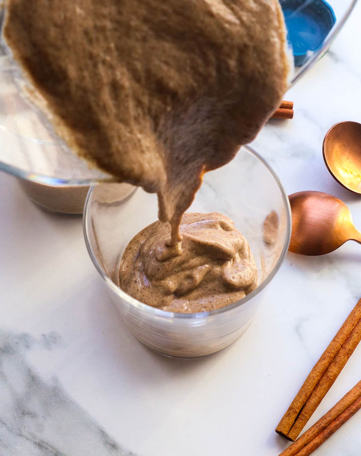 blended chia pudding poured into a serving dish.