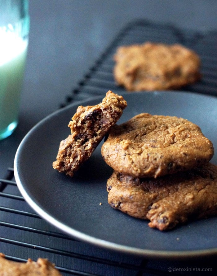 plate with chickpea chocolate chip cookies and a glass of milk