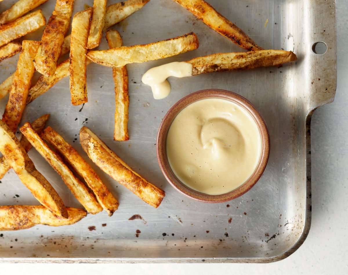 pan of fries with a small bowl of special sauce