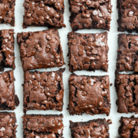 almond butter brownies sliced on parchment paper