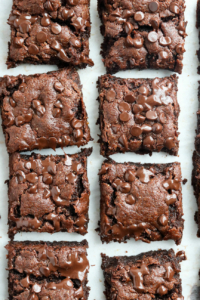 almond butter brownies sliced on parchment paper