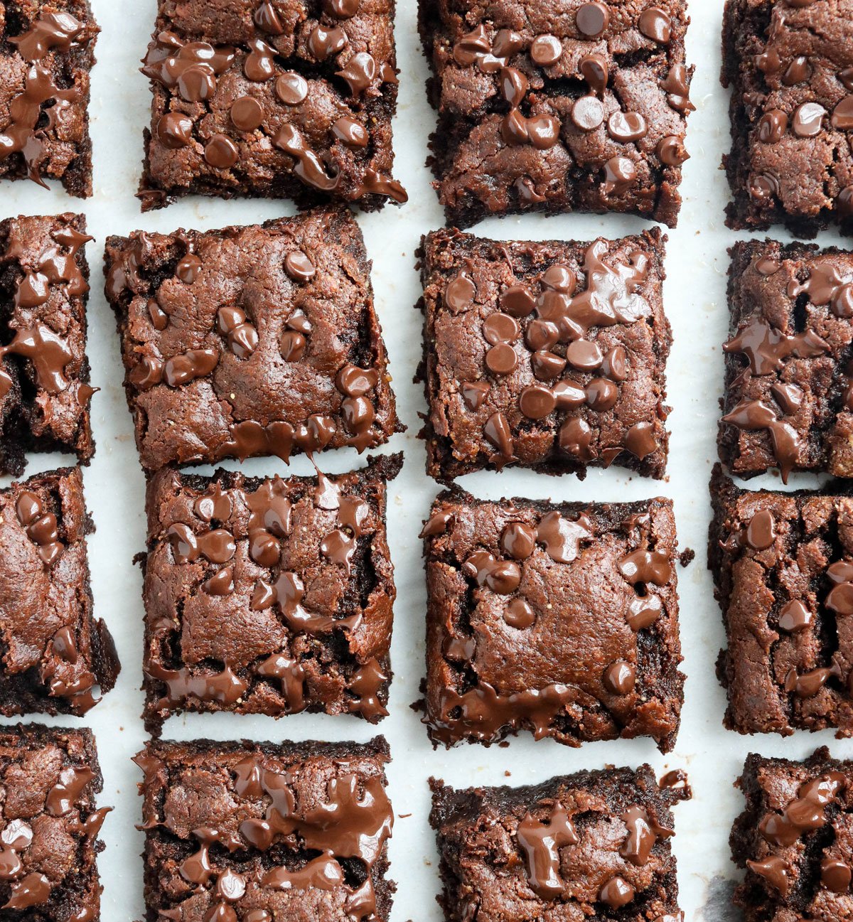 almond butter brownies sliced on parchment paper