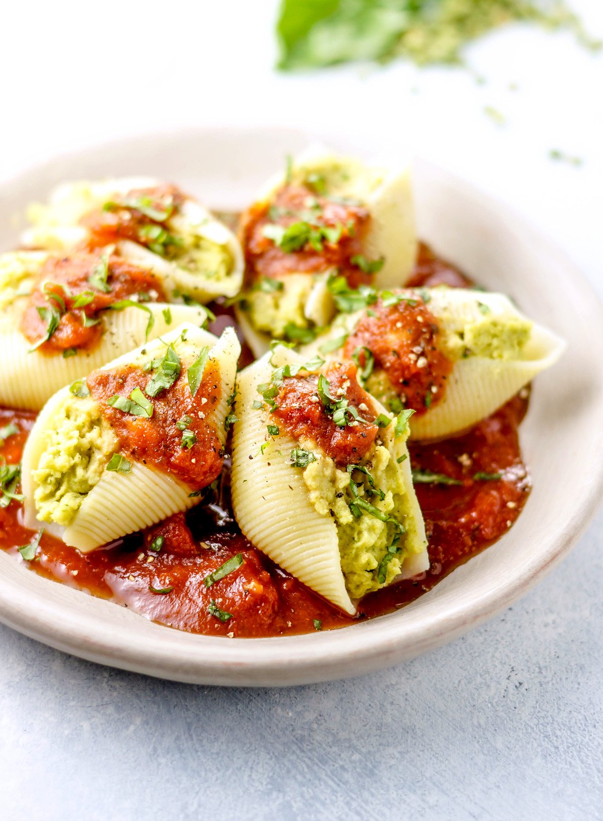 plate of split pea pesto stuffed shells