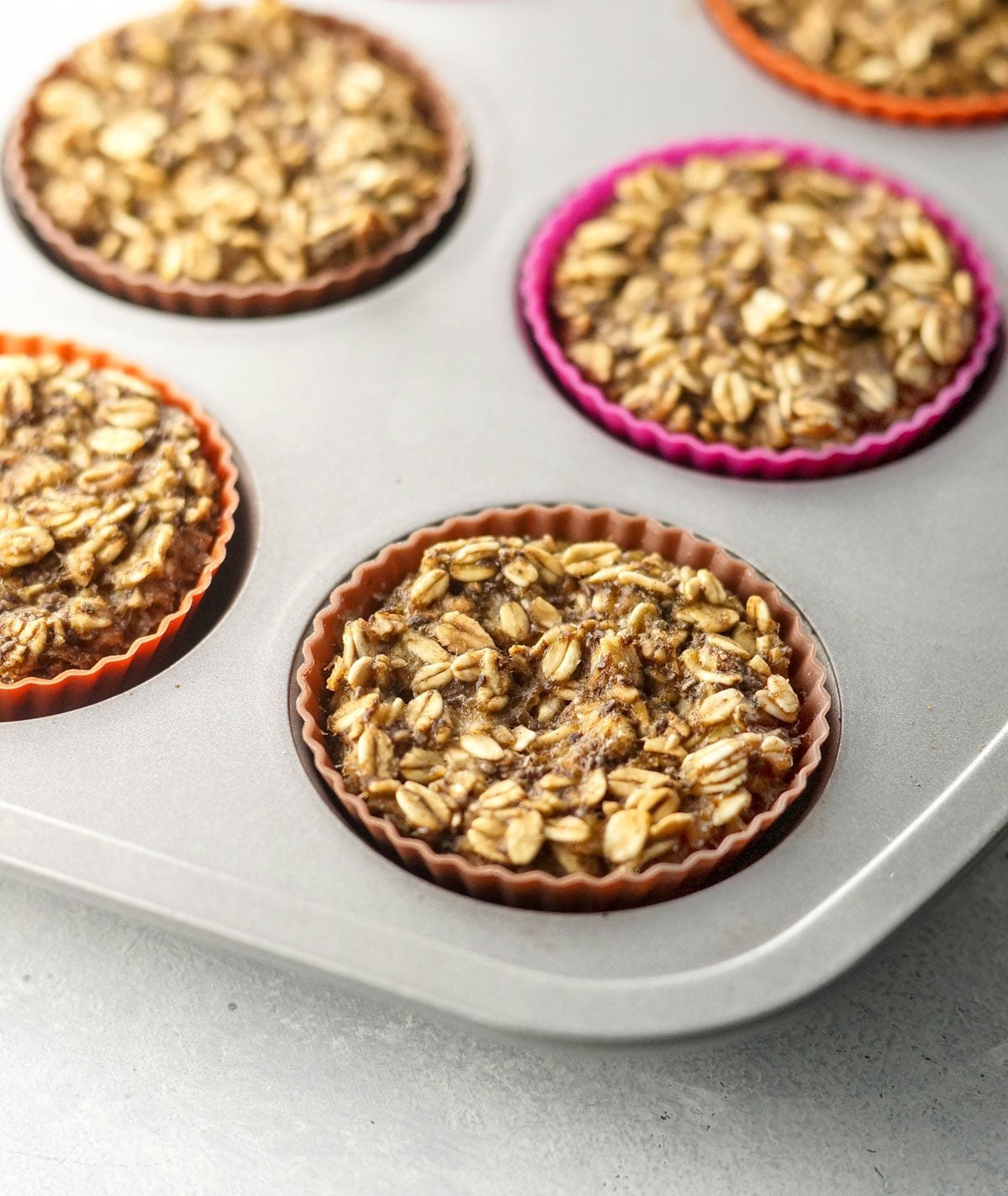 pan of baked banana oatmeal cups