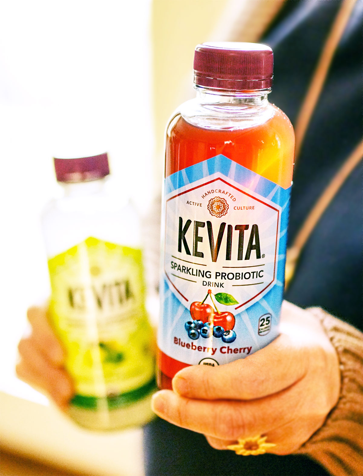 hand holding kevita probiotic drink