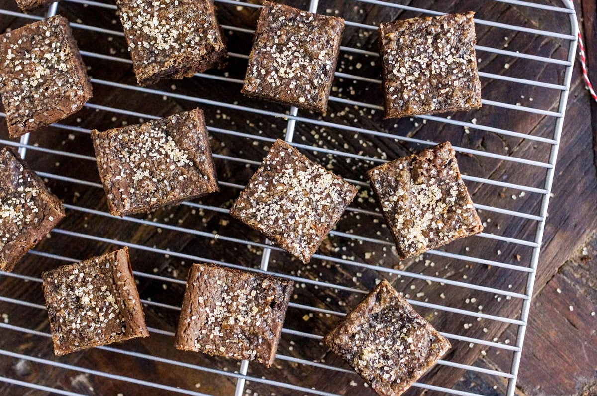 black bean gingerbread bars on a cooling rack with sugar on top