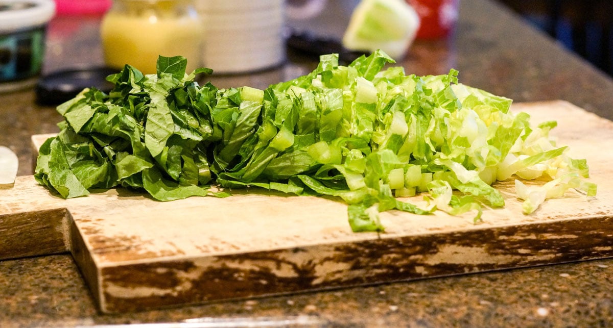 romaine lettuce on a cutting board