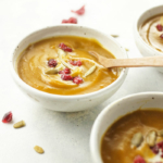 bowl of Instant Pot Curried Butternut Squash Soup with spoon
