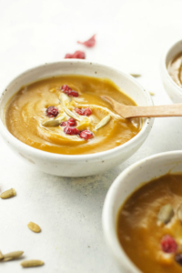 bowl of Instant Pot Curried Butternut Squash Soup with spoon
