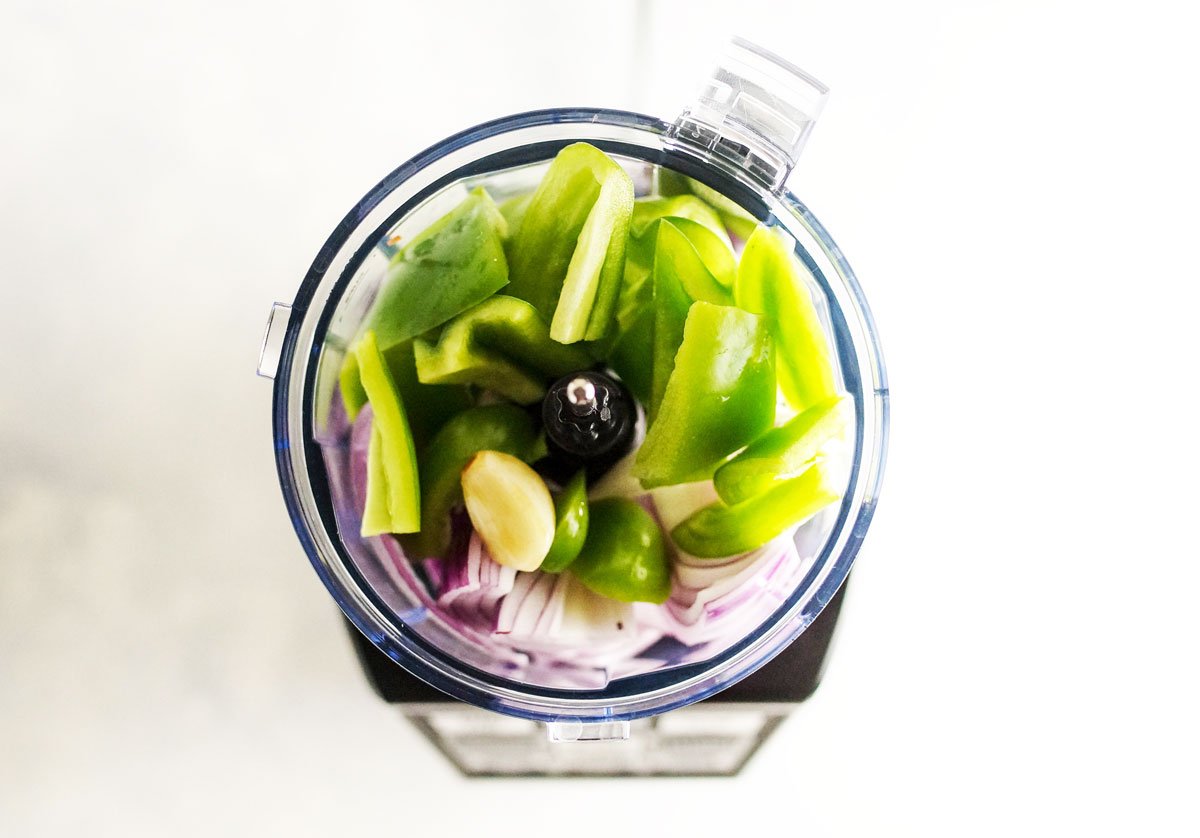 red onion, green pepper, and garlic in a ninja blender