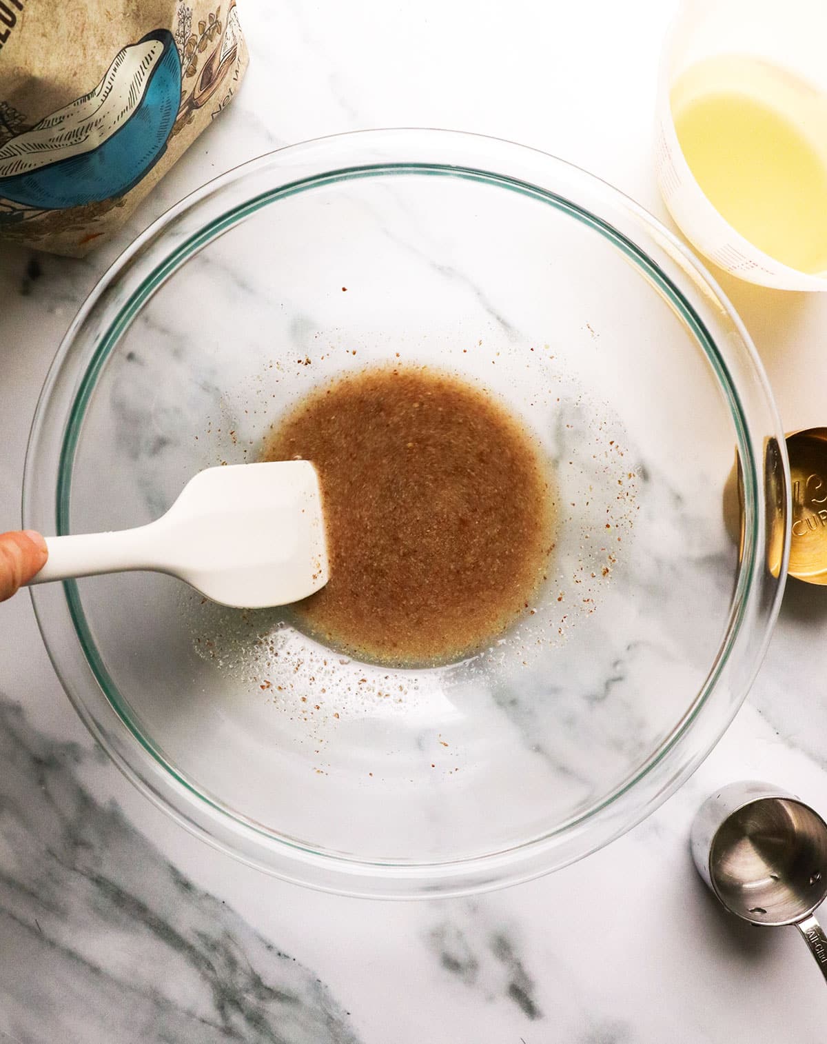 flax seed stirred with water in a glass bowl.
