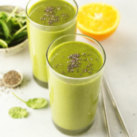 two green smoothies in glasses