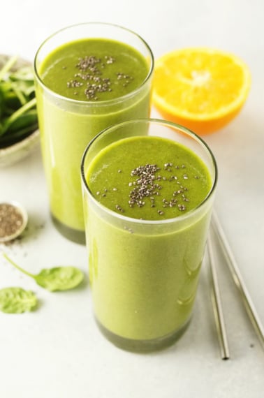 two green smoothies in glasses
