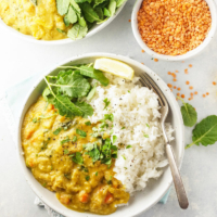 red lentil curry overhead with bowl of rice
