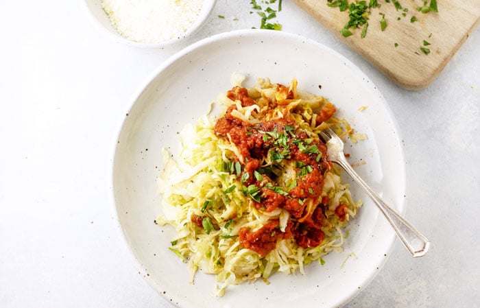 detox spaghetti on a plate with marinara sauce on top