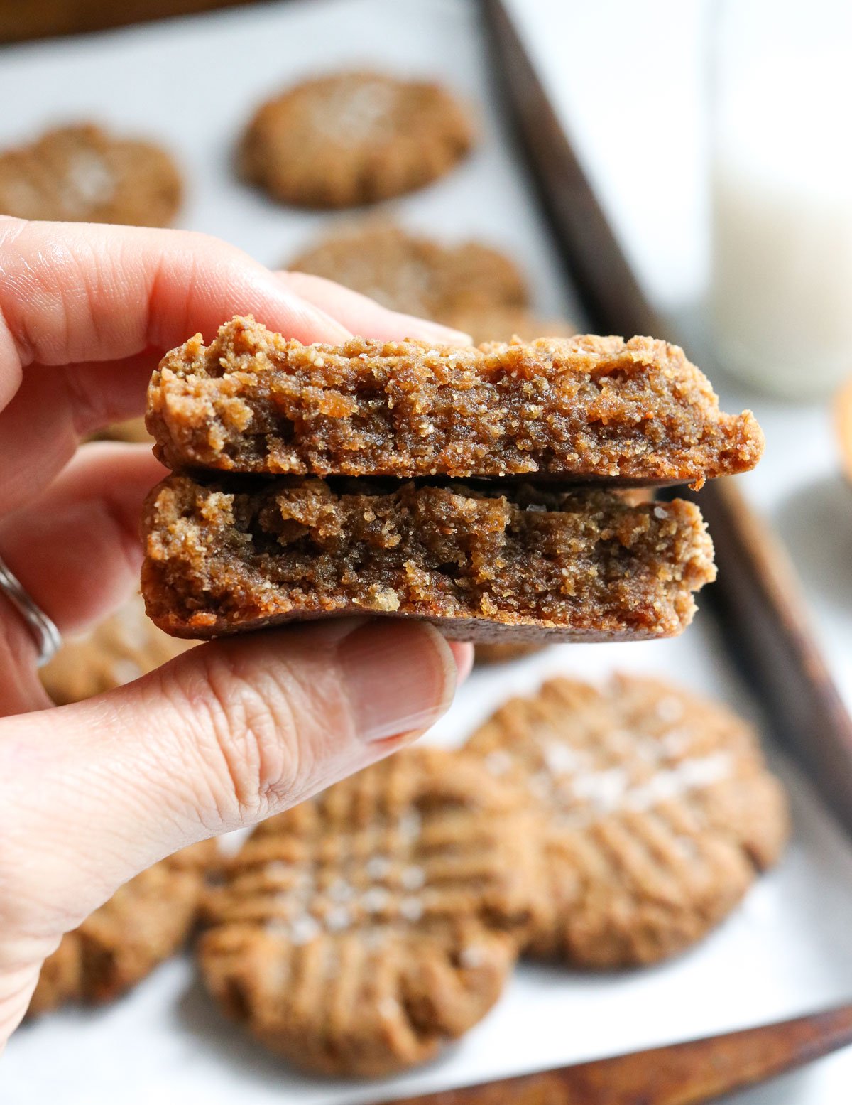 hand holding a date cookie split in half