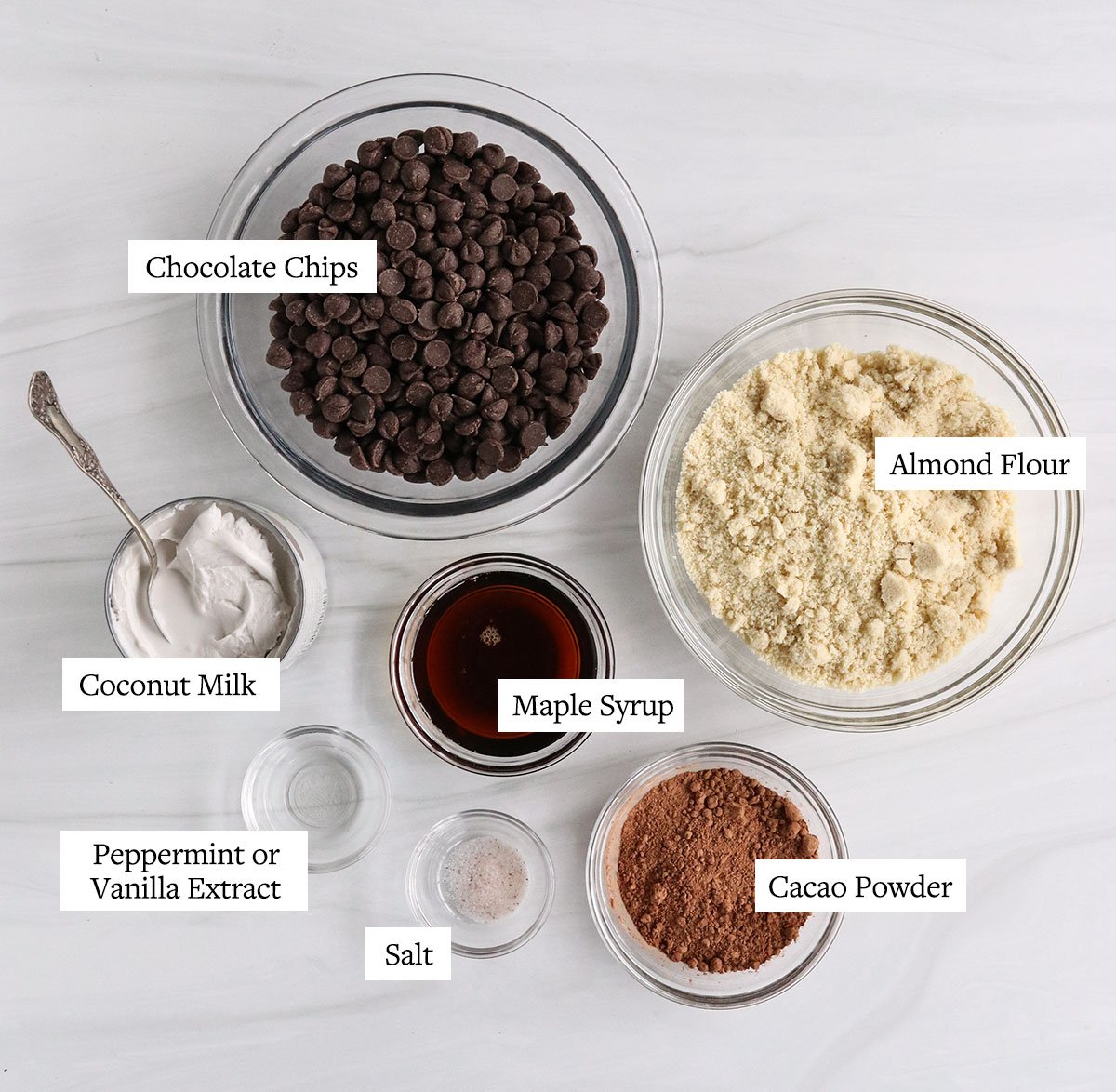 chocolate pie ingredients labeled in glass bowls.