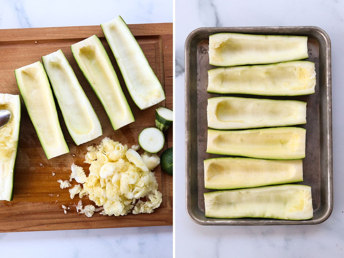 zucchini scooped out on cutting board and arranged on a baking sheet.