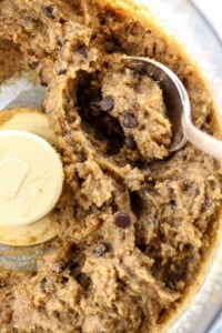 edible cookie dough in food processor with spoon
