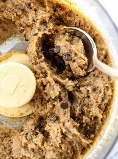 edible cookie dough in food processor with spoon