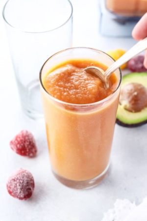 healthy fruit smoothie with strawberries and avocado