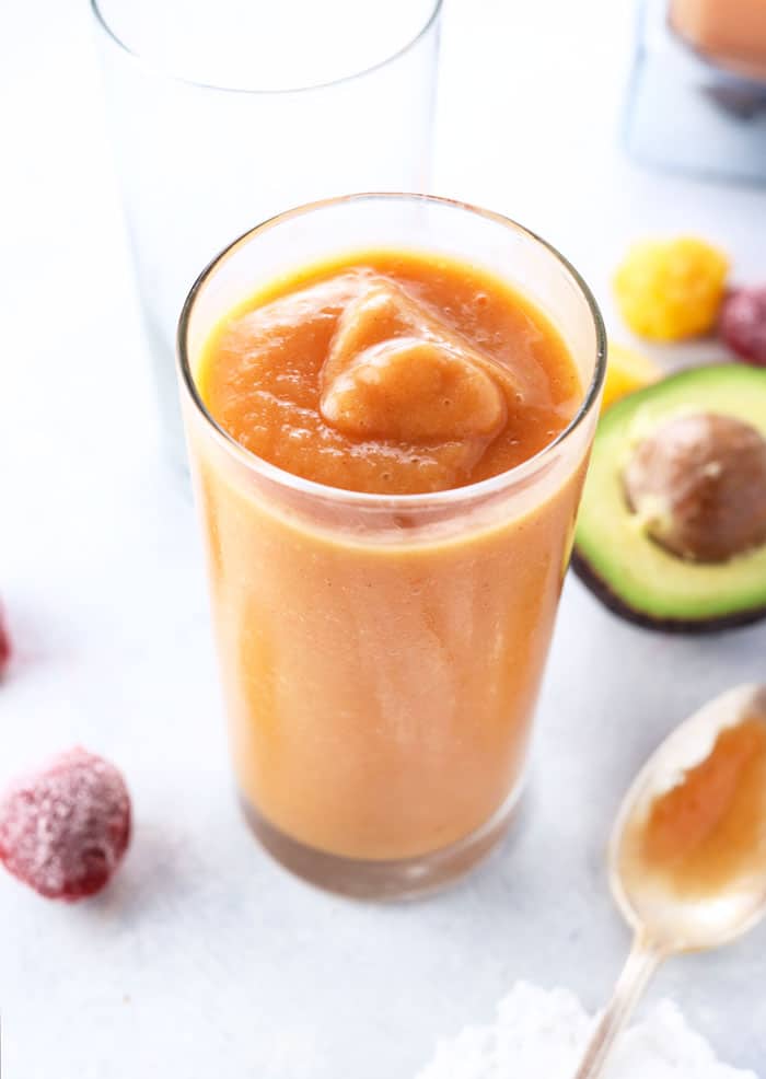 healthy smoothie recipe, with avocado, banana, strawberries and mango
