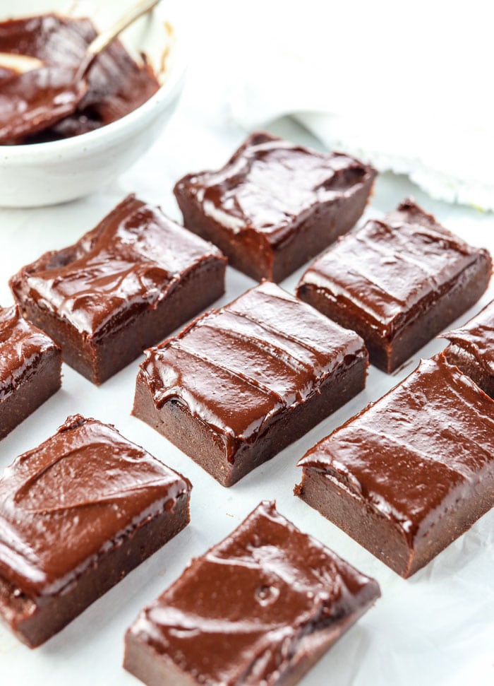 no bake brownies cut into rectangles with bowl in background