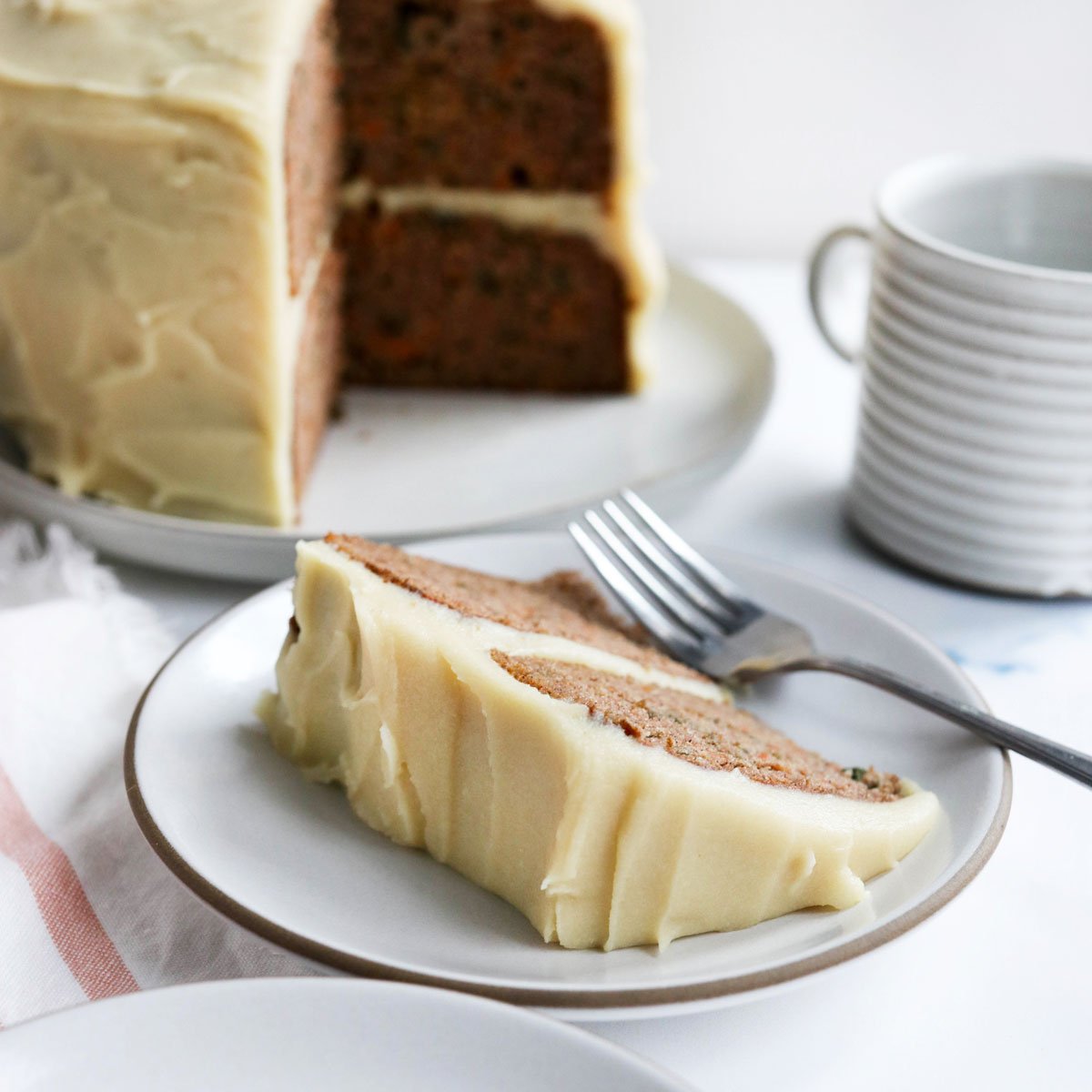 vegan cream cheese frosting on slice of cake
