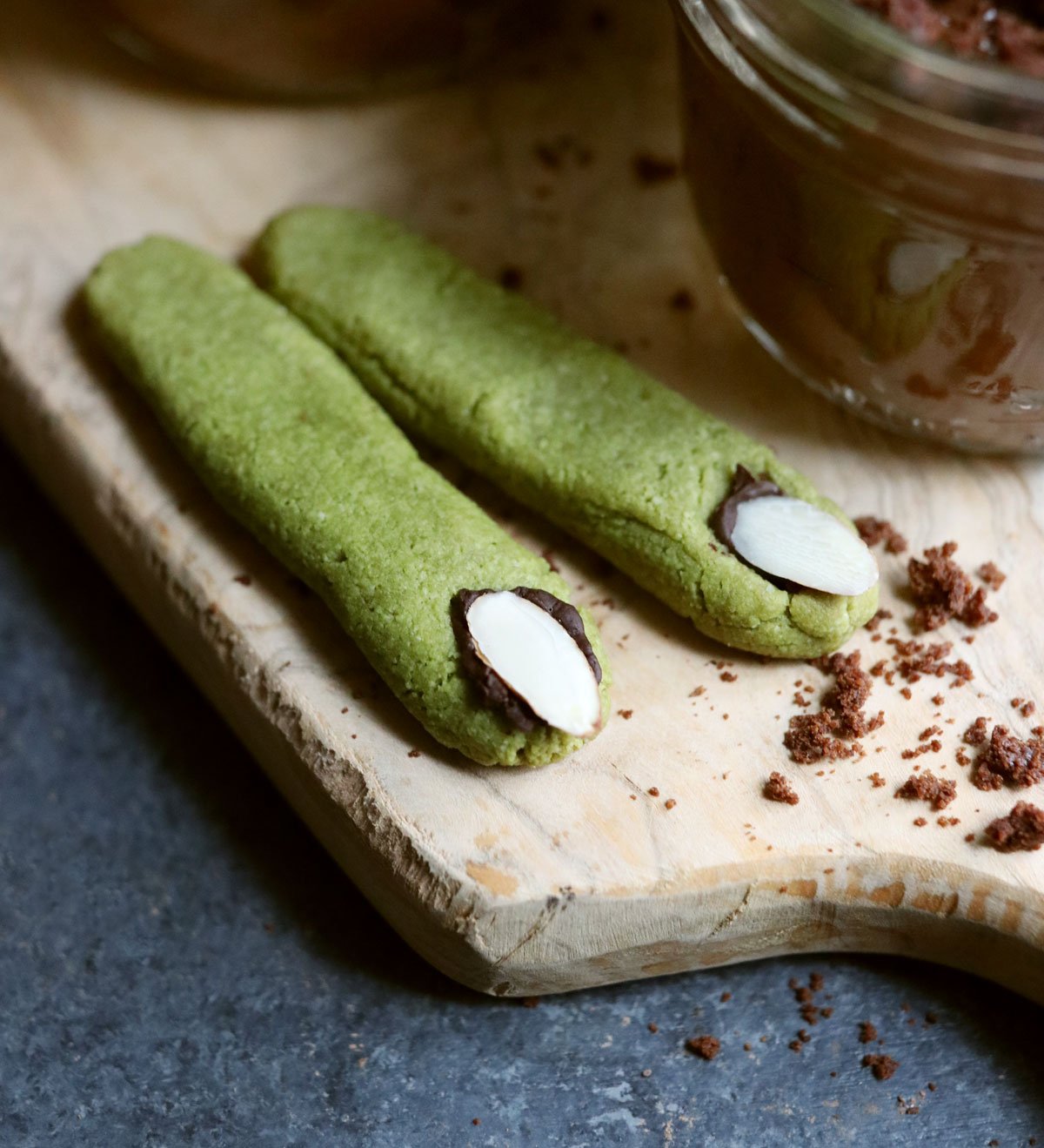 2 green cookies shaped like witch fingers