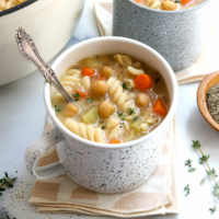chickpea noodle soup in 2 mugs