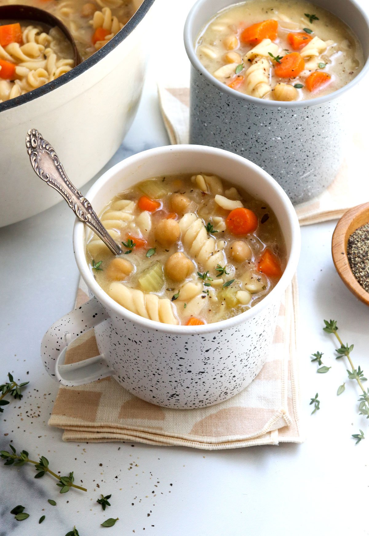 chickpea noodle soup in 2 mugs