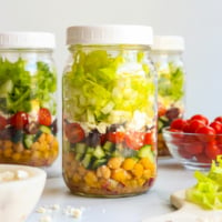 Mediterranean salad in a mason jar for meal prep.