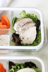 sliced chicken in a meal prep container