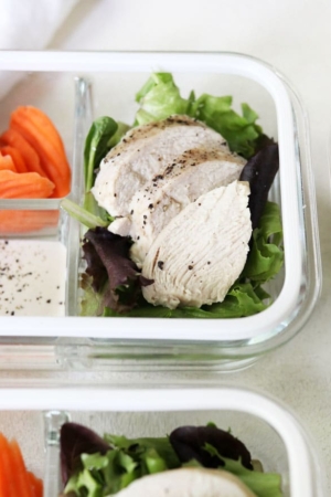 sliced chicken in a meal prep container