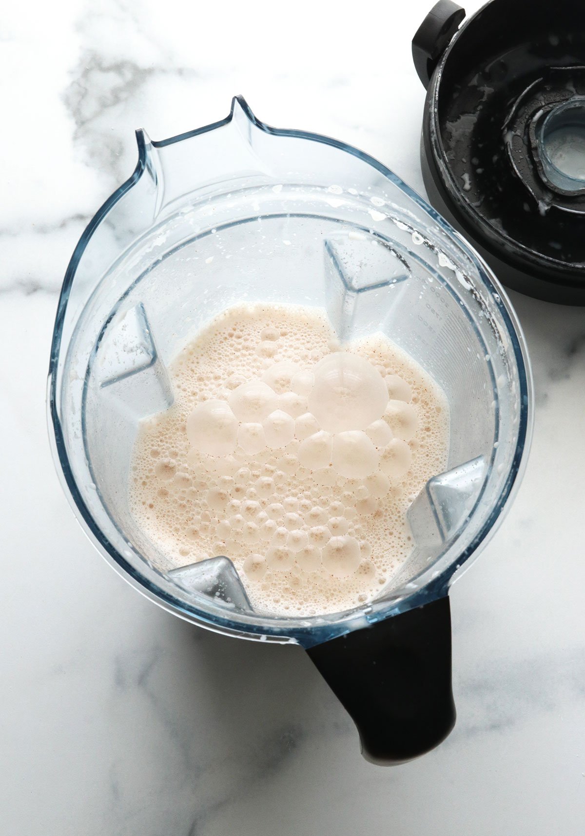 blended almond butter and water to make a creamy milk in blender. 