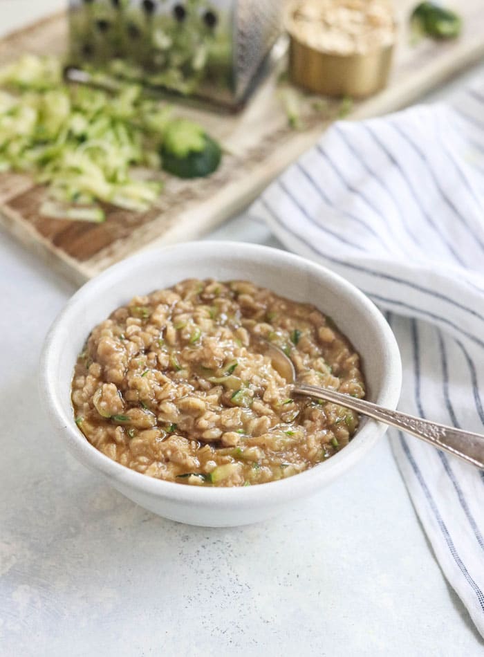 zucchini oatmeal in a white bowl