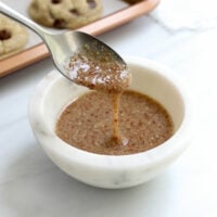 flax egg dripping off a spoon.