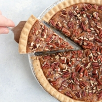 vegan pecan pie overhead with slice