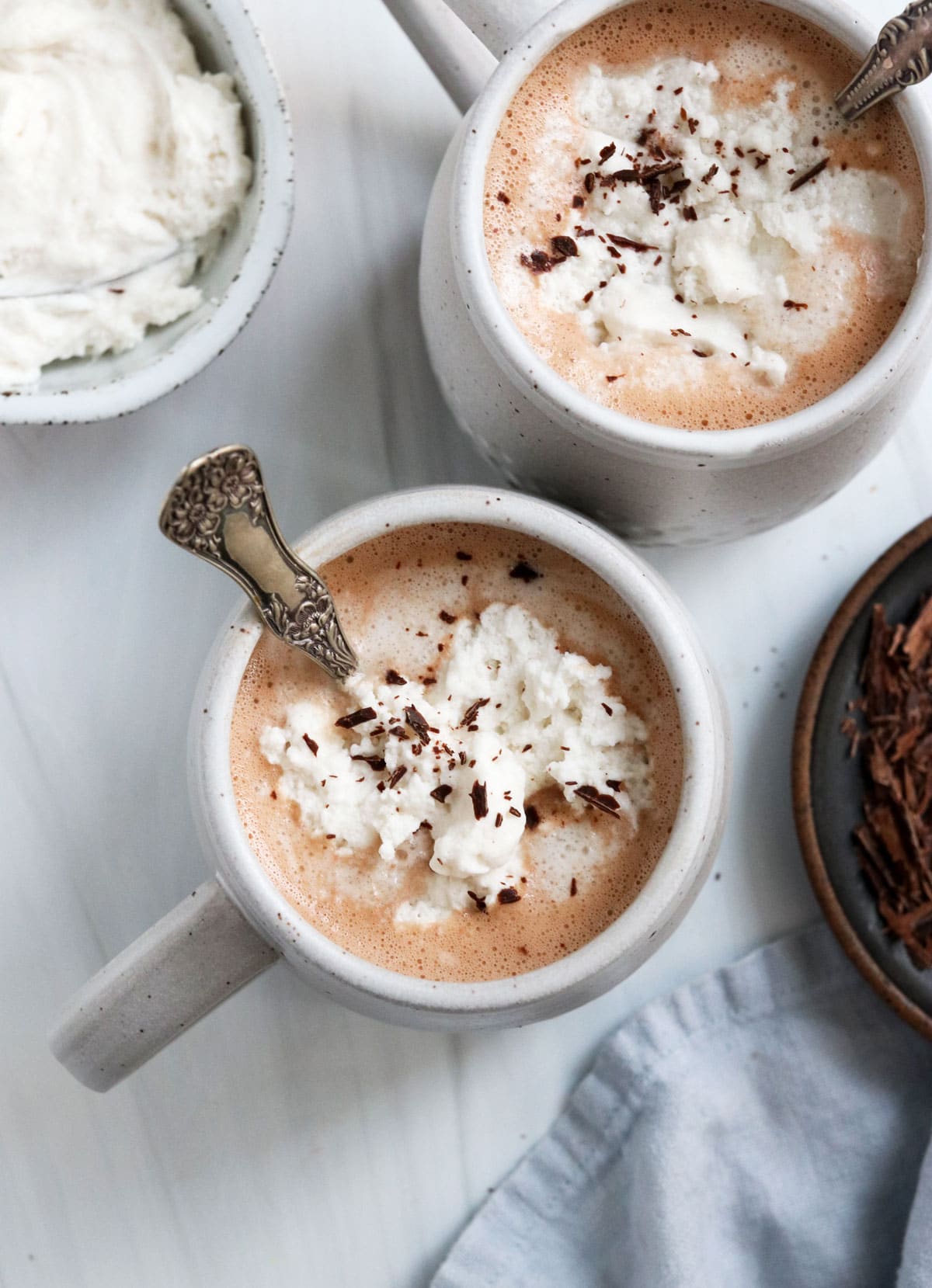 healthy hot chocolate overhead with whipped cream on top.