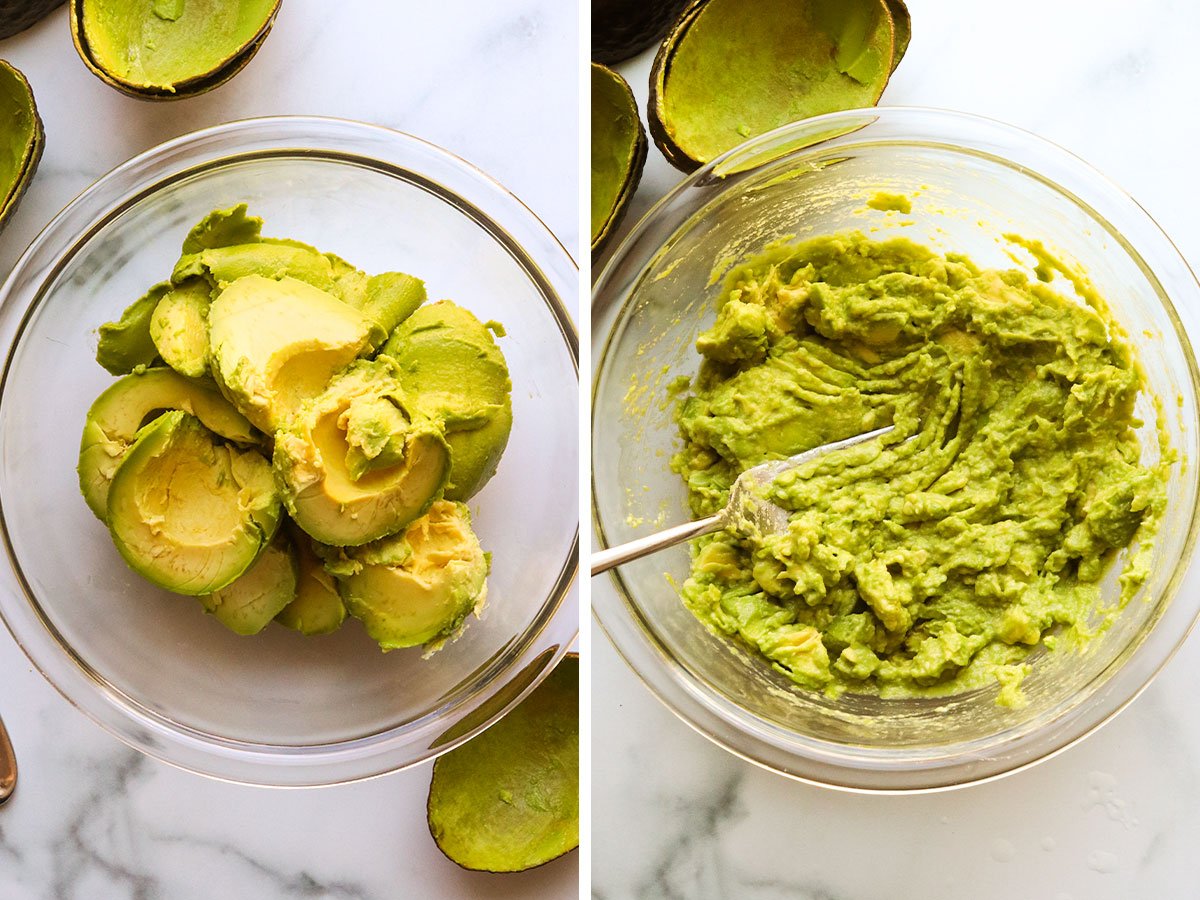 avocado added to a glass bowl and mashed with fork.