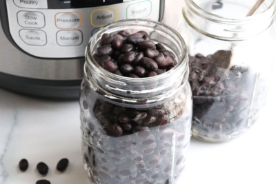 plain black beans in glass storage jars