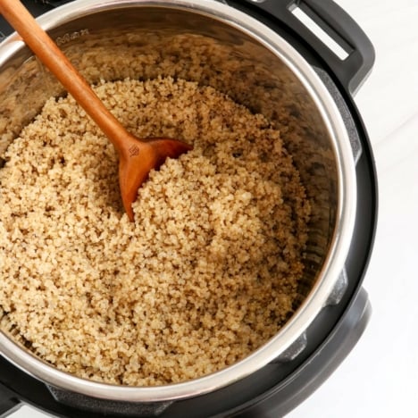 quinoa in the Instant Pot with spoon.