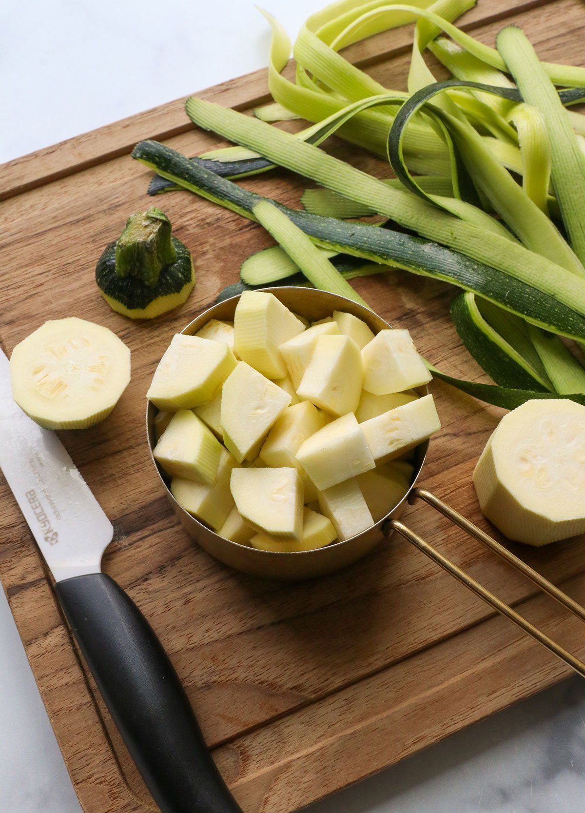 zucchini peeled and cut into measuring cup. 