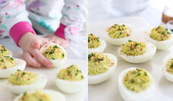 healthy deviled eggs being picked up by toddler