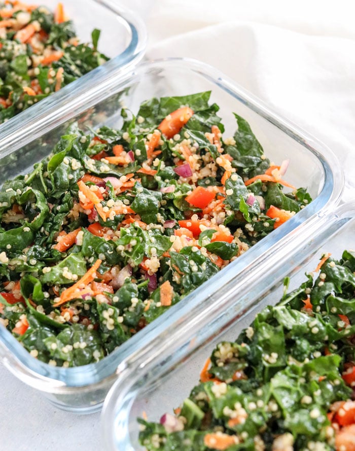 kale quinoa salad in meal prep container