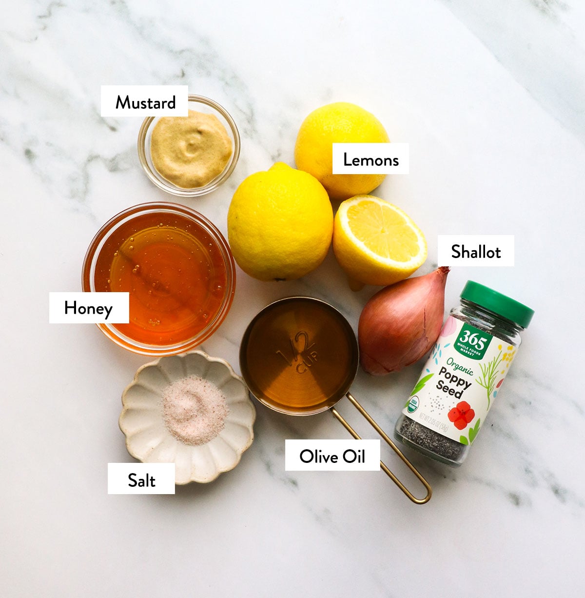 lemons, honey, shallot, olive oil, and poppy seeds labeled.