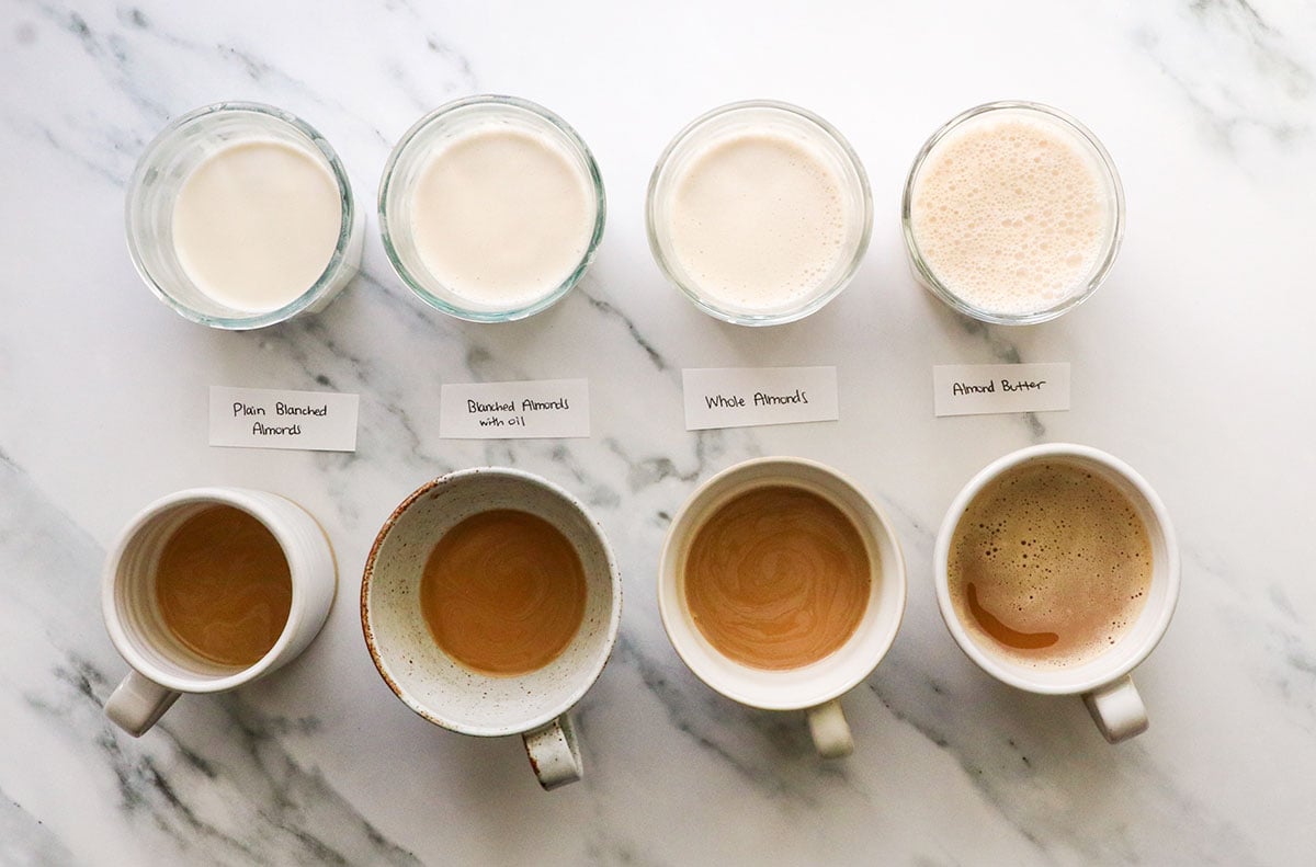 4 jars of dairy-free creamer added to 4 mugs of coffee so you can see the difference among experiments.