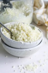 cauliflower rice in a bowl with spoon