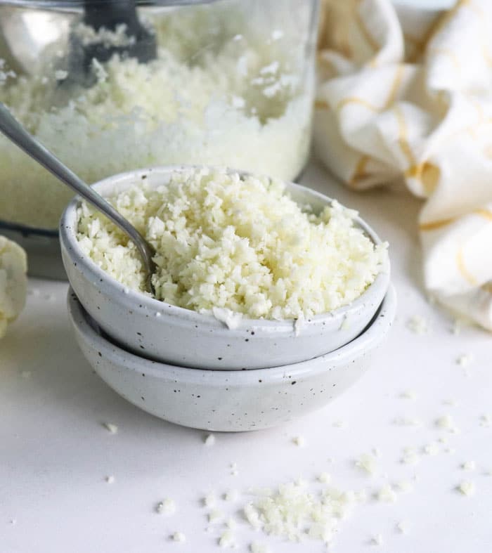 cauliflower rice in a bowl with spoon