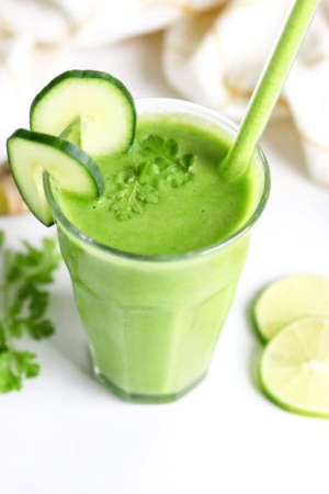 detox smoothie with cucumbers and cilantro on top